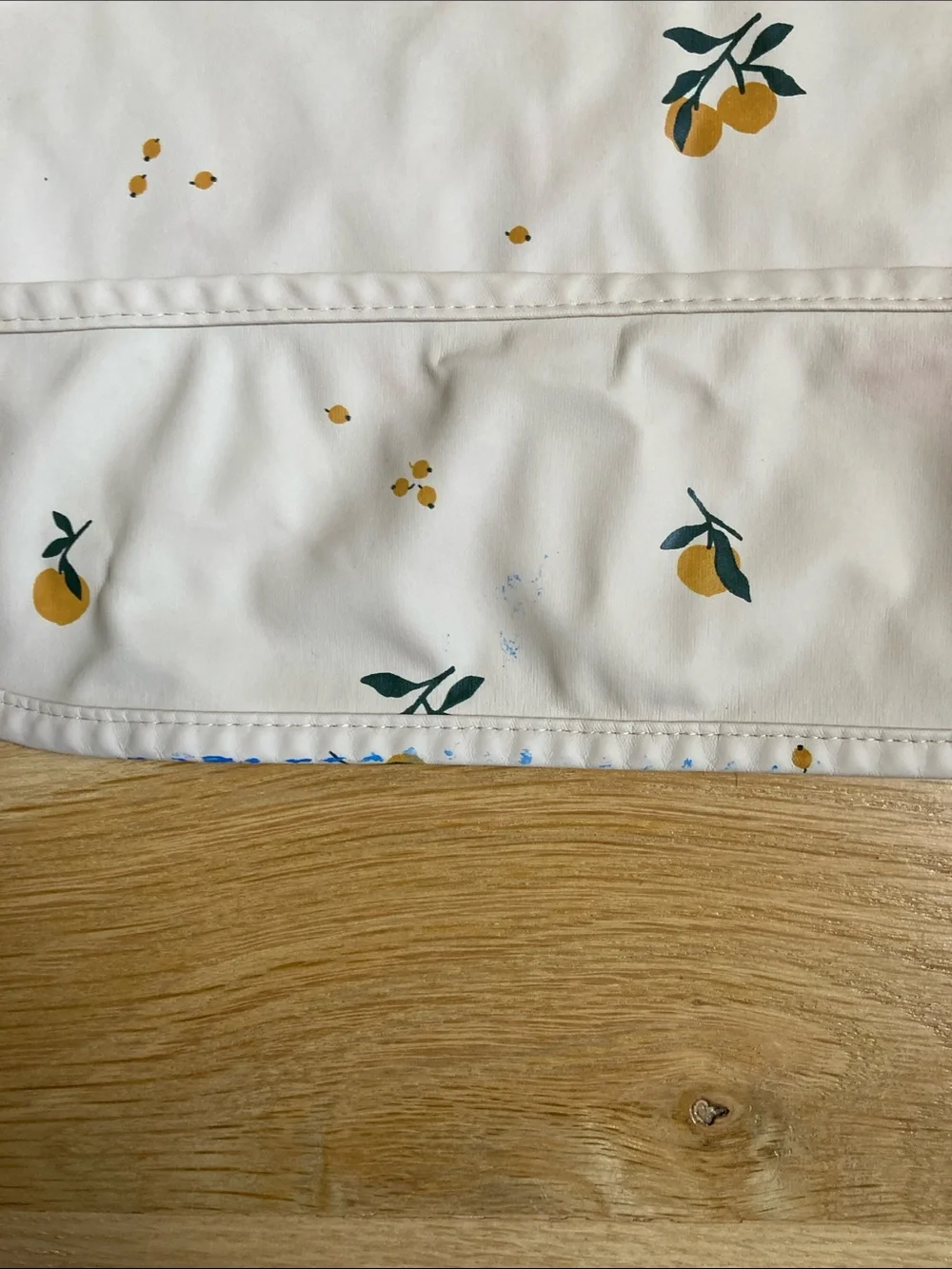 Waterproof Kids Feeding Bib Smock in Cream with Orange Print